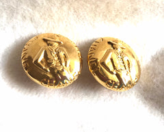 Vintage CHANEL gold tone round earrings with mademoiselle figure. Classic vintage Chanel jewelry. 0406011