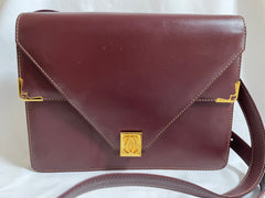 Vintage Cartier double flap envelope shoulder bag with gold-tone logo charm closure and frames. Classic purse from Must de Cartier. 0408172