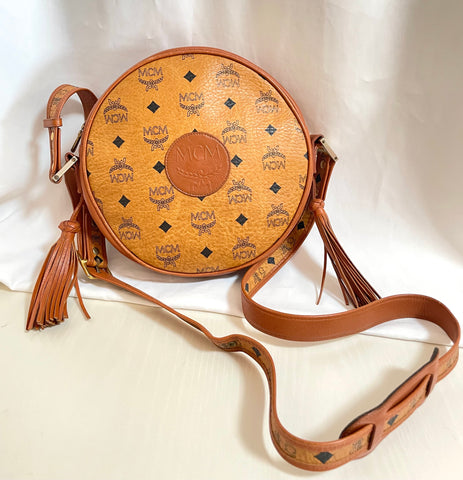 Vintage MCM brown monogram round Suzy Wong shoulder bag with brown leather trimmings. Designed by Michael Cromer. Unisex. 0411121