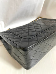 80's vintage Chanel black 2.55 shoulder bag with circle CC  flap design. Rare piece from the era. 0410283
