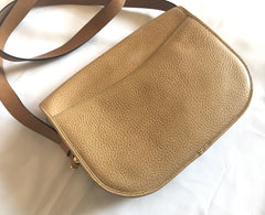 Vintage Christian Dior nude beige leather purse, shoulder bag with golden Dior motif. Classic purse.