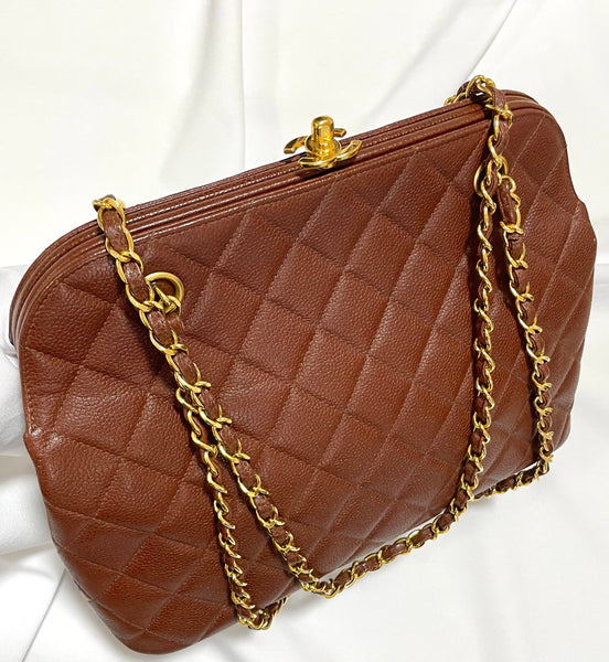 Vintage Chanel brown caviar leather shoulder bag with turn lock cc