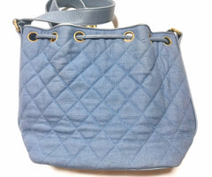 Vintage CHANEL blue quilted canvas and leather combo hobo bucket shoulder bag with drawstrings and golden CC mark balls.