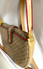 Vintage Gucci GG monogram shoulder bag with red and green webbing color convo shoulder bag. Golden and silver GG motif on the flap. 0411273