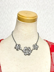 Vintage CHANEL silver matelasse camellia, rose flower charm necklace. Classic Chanel jewelry for your collection. So chic and mod. 0410031