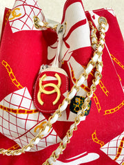 MINT. Vintage CHANEL red and white canvas large hobo shoulder bag with supermodel print and CC charm. Mademoiselle. 0407231