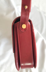 Vintage Lanvin wine leather shoulder bag with golden logo motif closure. Classic must have purse. 060620r2