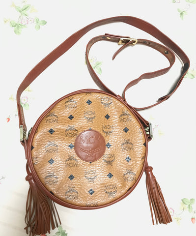 Vintage MCM brown monogram round Suzy Wong shoulder bag with brown leather trimmings. Designed by Michael Cromer. Unisex. 0404121