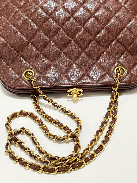Vintage Chanel brown caviar leather shoulder bag with turn lock cc
