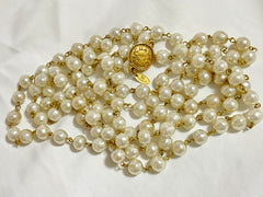 Vintage CHANEL faux pearl necklace, extra long necklace with golden round logo motif. Must have classic jewelry piece. 0408152