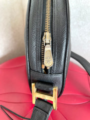 Vintage MCM black suzy wong, grained leather round shoulder bag with golden logo studs and fringes. Designed by Michael Cromer.0407051