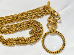 Vintage CHANEL long chain necklace with round loupe glass pendant top and CC motif. Gorgeous masterpiece. 0408246
