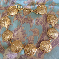 Vintage CHANEL rare statement necklace with logo embossed unique coin motif charms. Gorgeous masterpiece jewelry back in the old era.