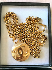 Vintage CHANEL golden chain necklace with round CC mark charm pendant top. Gorgeous jewelry. Best gift idea.