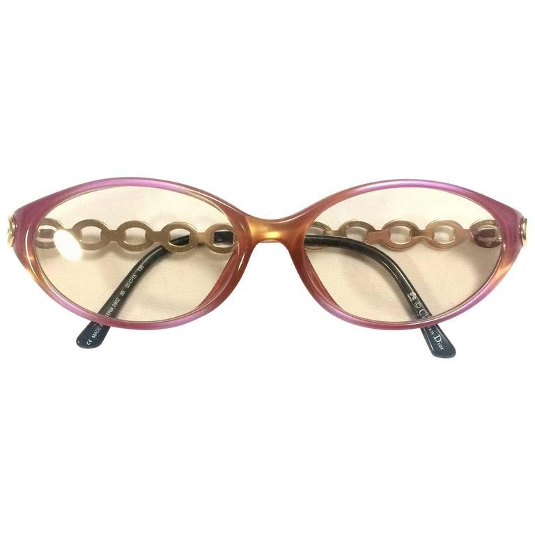 60's, 70's vintage Christian Dior pink and orange gradation sunglasses with golden chain temple. Unique and mod eyewear.