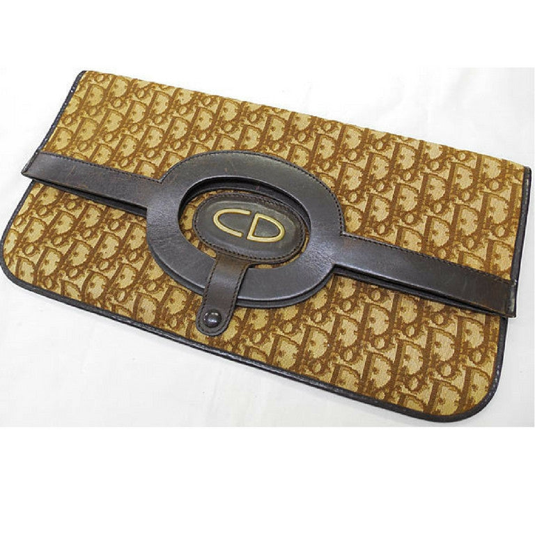 Vintage Christian Dior brown trotter clutch bag with CD gold charm