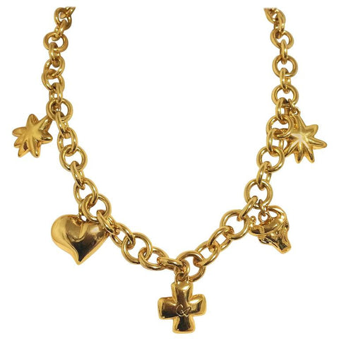 Vintage Christian Lacroix chain statement necklace with golden heart mark, star, clover, and bull charms. Rare masterpiece.