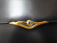 Vintage Cartier black navy genuine leather classic shape clutch bag with a blue stone. Masterpiece purse from Sapphire line