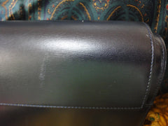 Vintage Cartier black navy genuine leather classic shape clutch bag with a blue stone. Masterpiece purse from Sapphire line