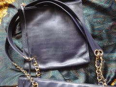 Vintage CHANEL clear vinyl and navy leather combination shoulder purse, tote with CC marks and matching pouch. Golden chain.