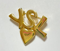W2 Vintage Yves Saint Laurent classic YSL logo and heart brooch. Perfect pin for hat, scarf, jacket etc. Great gift.0408173