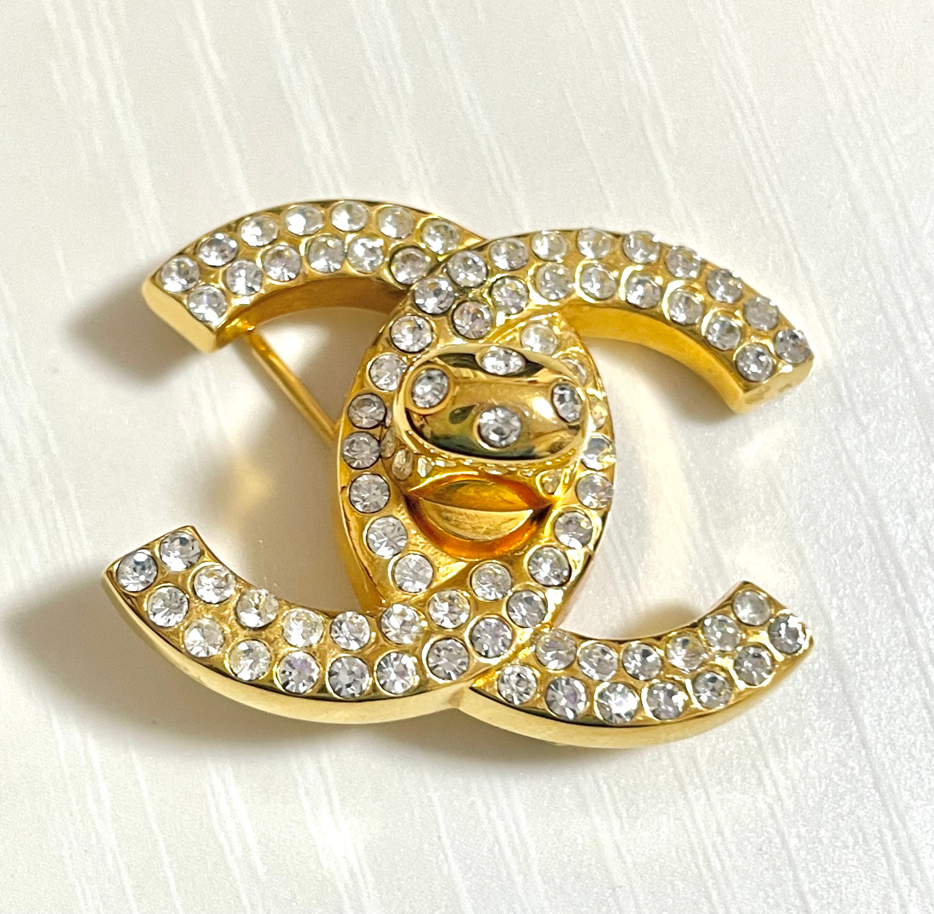 Vintage CHANEL golden turn lock CC pin brooch with crystals. Very classic and popular jewelry. Coco mark brooch. 0411251