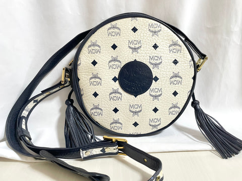 Vintage MCM navy and white monogram round shape Suzy Wong shoulder bag with leather trimmings. Unisex. Designed by Michael Cromer. 0412061