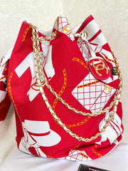 MINT. Vintage CHANEL red and white canvas large hobo shoulder bag with supermodel print and CC charm. Mademoiselle. 0407231