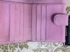 Vintage CHANEL milky pink caviar leather wallet with stitched CC mark. Classic.