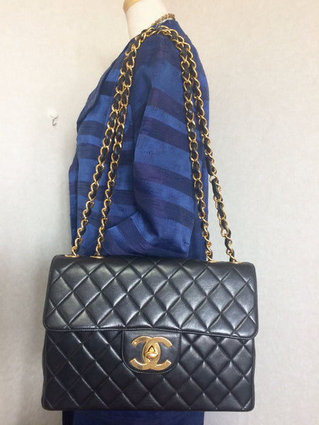 Vintage CHANEL black lamb leather large, jumbo shoulder bag with a