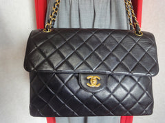 Vintage CHANEL black lambskin 2.55 classic jumbo, large shoulder bag with double side flap and golden CC closure