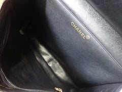 Vintage CHANEL black lambskin 2.55 classic jumbo, large shoulder bag with double side flap and golden CC closure