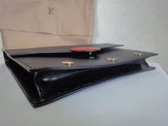 Vintage Louis Vuitton black epi mod clutch purse, shoulder bag with a red eye bull design closure. Rare masterpiece.