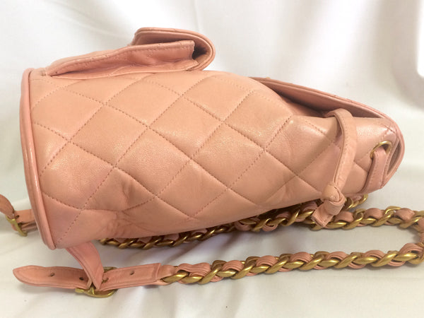 Vintage CHANEL quilted pink lamb leather backpack with golden