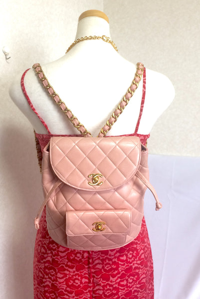 Vintage CHANEL quilted pink lamb leather backpack with golden