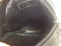 Vintage Valentino Garavani black intrecciato mini pouch style shoulder bag with V logo embossed pull. Classic purse.