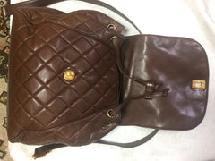 Vintage CHANEL quilted brown lamb leather backpack with gold chain strap and large CC closure. Classic and popular bag. Rare masterpice.
