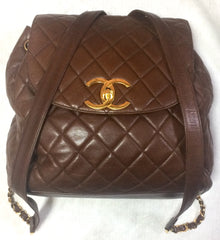 Vintage CHANEL quilted brown lamb leather backpack with gold chain strap and large CC closure. Classic and popular bag. Rare masterpice.