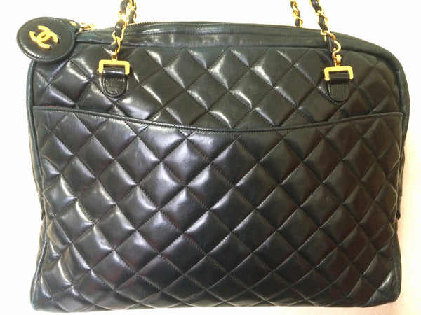 Vintage CHANEL black lambskin large classic bag with double golden