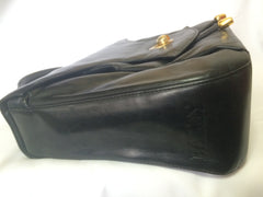 Vintage Bally black leather retro pop design bag, business purse with gold tone drawstrings and unique flap cut design.  Unisex use
