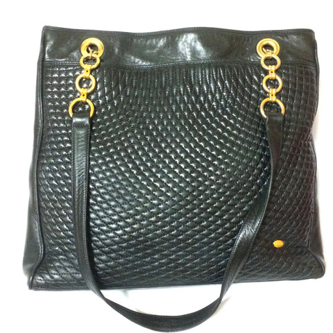 Vintage Bally classic black quilted leather large shopper tote bag with golden hoop chains and round logo plate.