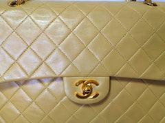 Vintage CHANEL beige color lambskin double flap 2.55 shoulder bag with golden chain strap. Must have medium size purse.