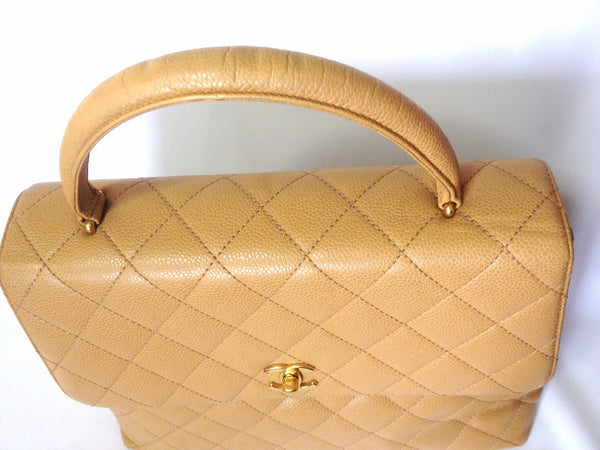 Vintage Chanel Wood Top Handle Kelly Ivory Caviar – Madison Avenue Couture