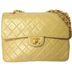 Vintage CHANEL beige color lambskin double flap 2.55 shoulder bag with golden chain strap. Must have medium size purse.