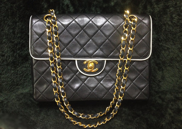 Vintage Chanel black lambskin 2.55 classic shoulder bag with gold