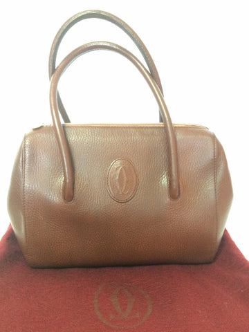 Vintage Cartier classic brown leather handbag with logo mark. les must de Cartier collection.