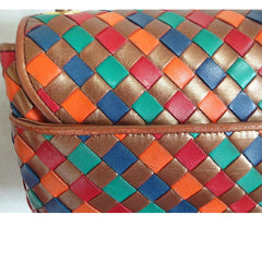 Vintage Bottega Veneta intrecciato shoulder bag, woven leather purse in multicolor of bronze, red, orange, green, and blue.