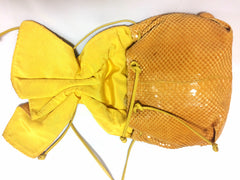 Vintage Carlos Falchi genuine yellow snakeskin shoulder bag in unique round form. Can be pouch too.