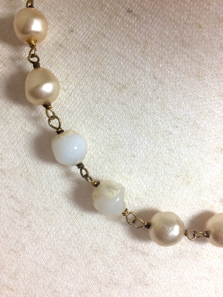 Vintage CHANEL white cream faux baroque pearl necklace with large CC mark  pendant top. Classic design jewelry from 80's.
