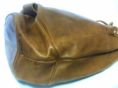 Vintage Christian Dior brown genuine nappa leather backpack design, large hobo bucket shoulder bag with golden logo. Unisex
